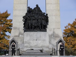 OTTAWA -- Two members of the Royal Canadian Navy stand on sentry duty at the Tomb of the Unknown Soldier at the National War Memorial on Tuesday, Nov. 9, 2021