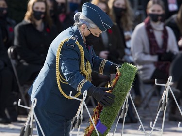 Governor General Mary Simon lays a wreath during Remembrance Day services at the National War Memorial on Thursday, Nov. 11, 2021