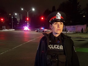 London police spokesperson Const. Sandasha Bough stands at the intersection of Wonderland Road and Riverside Drive near the scene of a multi-vehicle crash that sent "a number of" pedestrians to hospital. Photo taken Tuesday Nov. 30, 2021.