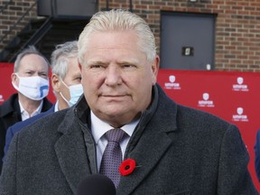 Premier Doug Ford officially announces a minimum wage increase to $15 from $14.35 on Nov. 2, in Milton, Ont.