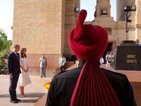 In this file photo, Britain's Prince William, Duke of Cambridge, along with his wife Catherine, Duchess of Cambridge, pay tribute at the India Gate war memorial in New Delhi, in memory of the soldiers from Indian regiments who served in the First World War I. Mostly, however, the West does not celebrate the key role of South Asian soldiers.