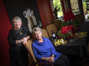 Homes for the Holidays, a fundraiser for Hospice Care Ottawa, is a virtual event this year, and begins Nov. 18. Homeowner Gail Joynt and Elizabeth Kaulback, a volunteer with Homes for the Holidays, in the beautifully decorated dining room of Gail’s home.