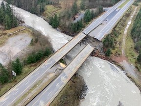 The Coquihalla Highway 5 is severed at Sowaqua Creek after devastating rain storms caused flooding and landslides, northeast of Hope, British Columbia.
