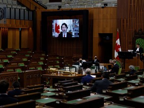 Prime Minister Justin Trudeau speaks virtually to a nearly empty House of Commons on Feb. 3, 2021.