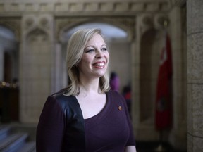 Sen. Denise Batters is shown near the Senate chambers on Parliament Hill in Ottawa, on Thursday, Feb. 18. She's been kicked out of the Conservative caucus.