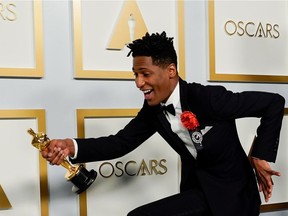 FILE PHOTO: Jon Batiste, winner of the award for best original score for "Soul," arrives at the press room of the Oscars, in the 93rd Academy Awards in Los Angeles, California, U.S., April 25, 2021.