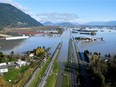 The Trans-Canada highway, partially submerged by floodwater, is shown near Abbotsford on Nov. 19.