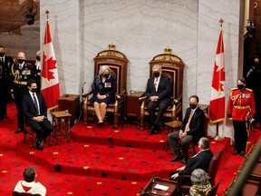 Canada's Prime Minister Justin Trudeau, Governor General Mary May Simon and her husband Whit Fraser attend the Throne Speech ceremony in the Senate, as parliament prepares to resume in Ottawa, November 23, 2021.