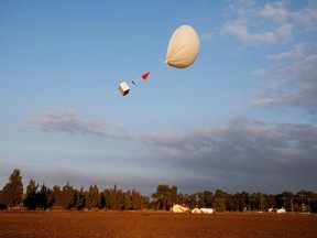 A balloon is seen during a demonstration by Israeli startup High Hopes Labs who are developing a balloon that captures carbon directly from the atmosphere at a high altitude, in Petah Tikva, Israel November 3, 2021.