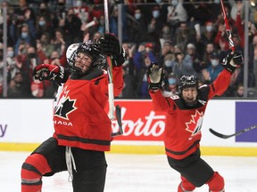 Canada's Sarah Fillier celebrates the team's second goal against the United States during a Rivalry Series game at the Leon's Centre on Sunday.