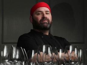 Chef Michael Korn poses for a photo at the Harmons Steakhouse on Elgin Street in Ottawa.