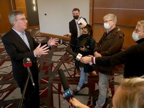 Ottawa Mayor Jim Watson talks to reporters after the province announced it was going forward with a public inquiry regarding Ottawa's LRT.