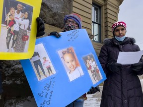 Somali refugee Nasro Adan Mohamed (R), who now lives in Brockville, Ont., and some supporters went to the Prime Minister's Office in downtown Ottawa on Tuesday to deliver a petition and to plead with Prime Minister Justin Trudeau to issue a special permit reuniting Nasro with her 3-year-old daughter, Afnaan, and husband, Liiban, who remain stuck in refuge in Uganda.