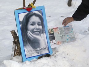 A photo of Kelly Morrisseau displayed at a vigil in 2015, 10 years after she was found dead in Gatineau Park.