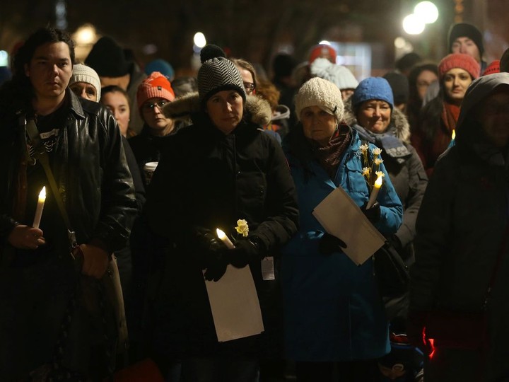  People gather at the Women’s Monument at Minto Park on the 30th anniversary of the massacre at l’Ecole Polytechnique.