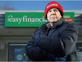 Acorn's Vanier chair Bader Abu-Zahra stands outside an Easy Financial on Donald Street. He says Vanier has among the highest concentrations of payday lenders in Canada and the pandemic has only increased the demand.