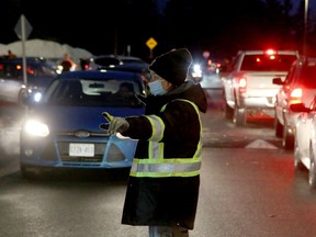 There was gridlock around the Walter Baker Sports Center for handing out free fast antigen tests on Thursday. People were rejected after 1,000 COVID-19 rapid antigen tests ran out minutes after 7 a.m. - the time the site was scheduled to open. People reported queuing four streets away from 4 a.m. to get the test kits, leaving many others frustrated when they showed up on time. Julie Oliver / POSTMEDIA