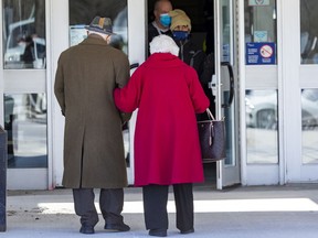 A file photo from March shows Ottawa residents age 80 and over arriving at the Ottawa Public Health community vaccination clinic at the Nepean Sportsplex.