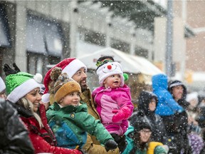 Nothing can stop Santa and the firefighters, as the Help Santa Toy Parade went from City Hall, down Laurier Ave till Bank Street where it wrapped up through the Glebe near Lansdowne.