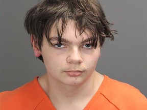 In this file photo taken on December 02, 2021 and released by the Oakland County Sheriff's Office in Michigan, shows shooting suspect Ethan Crumbley. The parents of a 15-year-old boy who shot dead four fellow students at his high school in Michigan are being charged with involuntary manslaughter on December 3, 2021.