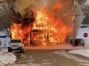 The Portland Ontario fire Dept building goes up in flames on Tuesday afternoon.