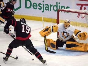 Ottawa Senators right wing Drake Batherson (19) sets up for a goal against Pittsburgh Penguins goalie Casey DeSmith (1) in the third period at the Canadian Tire Centre.