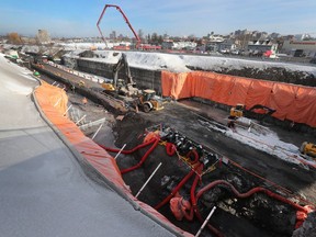 OTTAWA - March 10, 2021: Working on the Stage 2 Trillium Line construction behind Preston Street in central Ottawa.