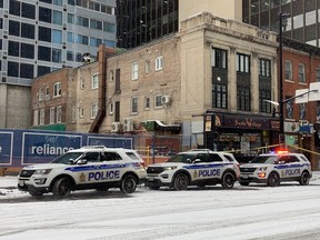A man critically injured with a gunshot wound was picked up on Rideau Street Wednesday morning and taken to hospital, say paramedics.