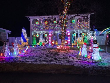 Homes decorated with holiday lights.  Trimble Cres.