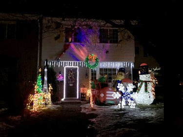 Homes are decorated with holiday lights in celebration of the festive season.  Craig Henry neighbourhood.
