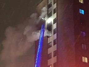 Ottawa firefighters on the scene at fire on eight floor of Meadowlands early Thursday.