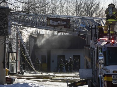 Firefighters and other first responders were on site of a three alarm fire on Colonnade Road South Saturday, January 8, 2022.