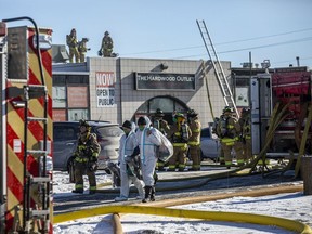 Firefighters and other first responders were on site of a three-alarm fire on Colonnade Road South Saturday. Firefighters were leaving the scene with their gear in bags to be decontaminated back at the station.