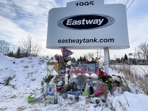 A memorial to the victims of a fire at the Eastway Tank company at the entrance to the company on Monday, Jan. 24, 2022.