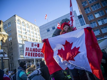 Thousands gathered in the downtown core for a protest in connection with the Freedom Convoy that made their way from various locations across Canada and landed in Ottawa, Saturday January 29, 2022.