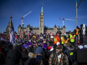Protesters gathered around Parliament Hill and the downtown core for the Freedom Convoy protest, some making their way from various locations across Canada, Sunday January 30, 2022.