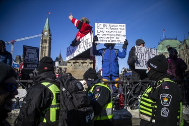 Protesters gathered around Parliament Hill and the downtown core for the Freedom Convoy protest that made their way from various locations across Canada, Sunday Jan. 30, 2022.