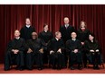 Members of the U.S. Supreme Court are, seated from left: Associate Justice Samuel Alito, Associate Justice Clarence Thomas, Chief Justice John Roberts, Associate Justice Stephen Breyer and Associate Justice Sonia Sotomayor. Standing from left: Associate Justice Brett Kavanaugh, Associate Justice Elena Kagan, Associate Justice Neil Gorsuch and Associate Justice Amy Coney Barrett.