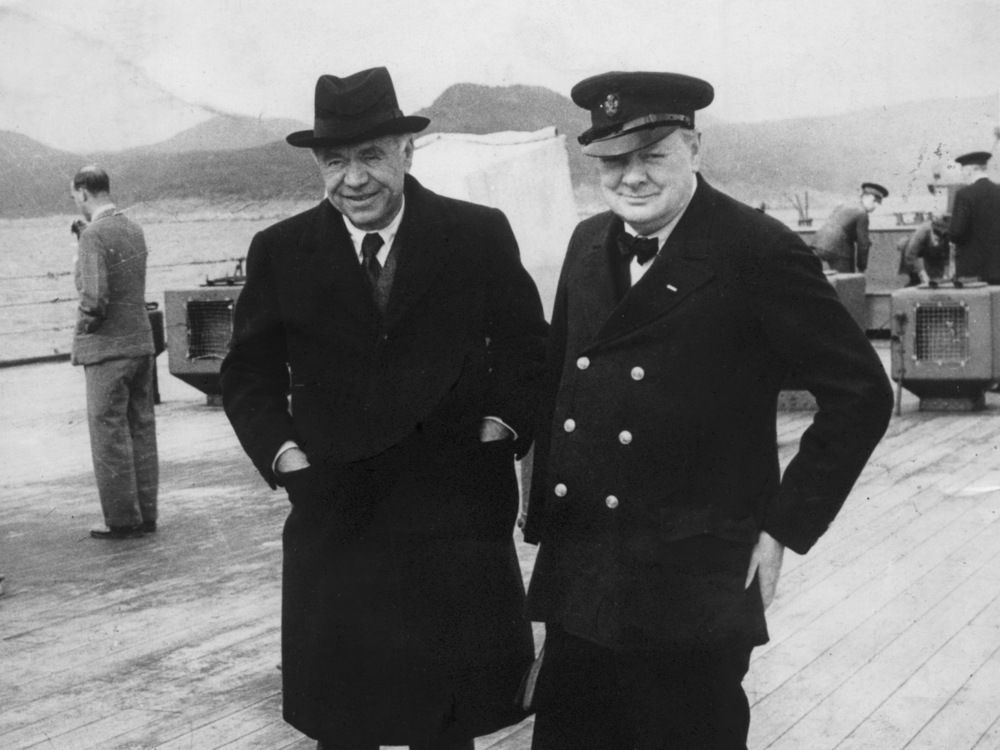 Canadian-British press magnate Max Aitken, Lord Beaverbrook, left, with British Prime Minister Winston Churchill, is seen on board HMS Prince of Wales during the Atlantic Conference in Newfoundland with U.S. President Franklin D. Roosevelt in August 1941.