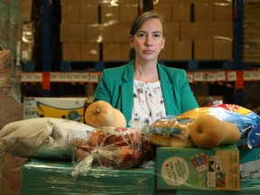 Rachael Wilson, CEO of the Ottawa Food Bank, says will have to rely on cash reserves to keep supplying its programs, and she worries this crunch — fewer donations, more demand — might last a year or two.