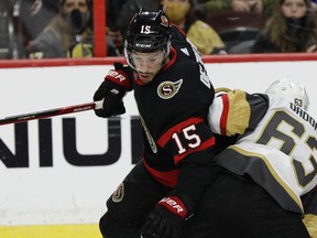 Ottawa Senators defenceman Michael Del Zotto (15) checks Vegas Golden Knights right wing Evgenii Dadonov (63) during second period NHL action at the Canadian Tire Centre on Nov. 4, 2021.