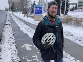 Tim Hore cycled through a snowstorm in February 2011 to make his voice heard at a city hall transportation committee meeting, during which councillors approved the creation of the Laurier bike lanes.
