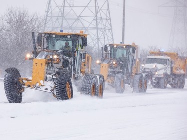 OTTAWA -- Snow removal graders and s plough clearing Hunt Club Road. Monday, Jan. 17, 2022 -- . ERROL MCGIHON, Postmedia