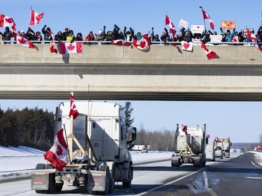 Supporters of truckers protesting the Canadian government's vaccine mandate for cross-border truckers gathered on the Dilworth Road near the Highway 416 overpass as the convoy made its way to Ottawa. Friday, Jan. 28, 2022.