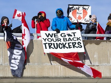 Supporters of truckers protesting the Canadian government's vaccine mandate for cross-border truckers gathered on the Dilworth Road highway 416 overpass as the convoy made its way to Ottawa. Friday, Jan. 28, 2022