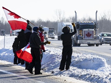 Supporters of truckers protesting the Canadian government's vaccine mandate for cross-border truckers gathered on the Dilworth Road highway 416 overpass as the convoy made its way to Ottawa. Friday, Jan. 28, 2022 -