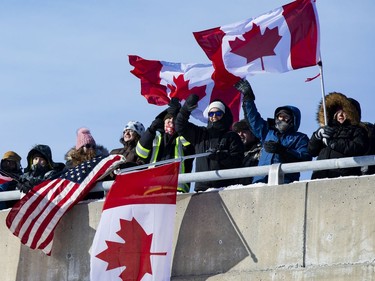 Supporters of truckers protesting the Canadian government's vaccine mandate for cross-border truckers gathered on the Dilworth Road highway 416 overpass as the convoy made its way to Ottawa. Friday, Jan. 28, 2022