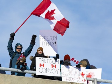 Supporters of truckers protesting the Canadian government's vaccine mandate for cross-border truckers gathered on the Dilworth Road highway 416 overpass as the convoy made its way to Ottawa. Friday, Jan. 28, 2022