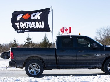 Supporters of truckers protesting the Canadian government's vaccine mandate for cross-border truckers gathered on the Dilworth Road highway 416 overpass as the convoy made its way to Ottawa. Friday, Jan. 28, 2022