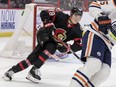 Senators left wing Tim Stuetzle (18) pursues Edmonton Oilers defenceman Darnell Nurse (25) during first period NHL action at the Canadian Tire Centre on January 31, 2022.